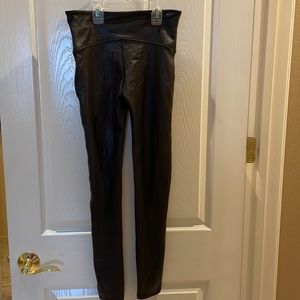 SPANX . Labeled a size medium.Tight slim fit